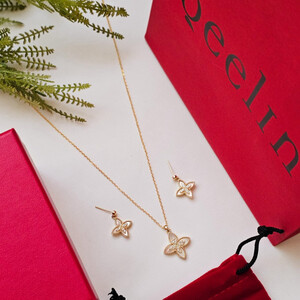 طقم سلسال وحلق من ماركة كوين