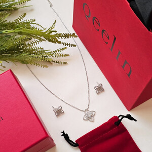 طقم سلسال وحلق من ماركة كوين