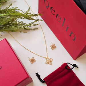 طقم سلسال وحلق من ماركة كوين